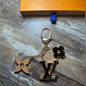 Louis Vuitton LV black and Tan Keychain Chain Flowers Gold dust bag NIB